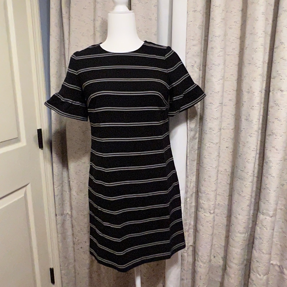 Super cute black shift dress with fun trumpet sleeve